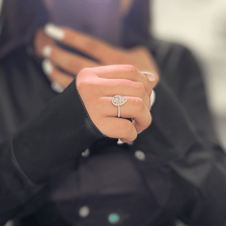 2.0ct Lab Ruby Pear Cut Moissanite Halo Ring